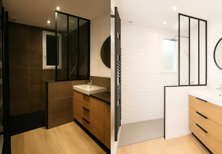 Salle de bain sombre avec douche à l'italienne, lavabo et meuble en bois. Le contraste entre les carreaux sombres et le blanc crée une ambiance moderne.