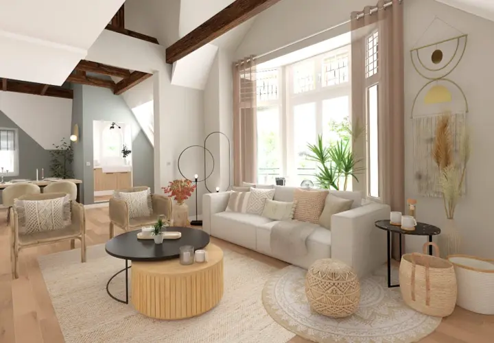Un salon lumineux avec des poutres apparentes, un canapé blanc confortable, des fauteuils en rotin et une table basse en bois. La déco salon lumineux est complétée par des coussins texturés et des éléments naturels.