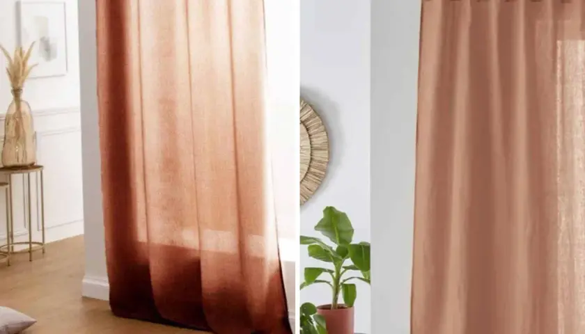 Quel rideau avec mur terracotta ! Un tissu léger aux dégradés chauds, apportant une touche naturelle et chaleureuse à l'espace.