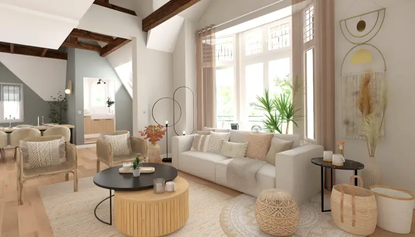 Un salon lumineux avec des poutres apparentes, un canapé blanc confortable, des fauteuils en rotin et une table basse en bois. La déco salon lumineux est complétée par des coussins texturés et des éléments naturels.