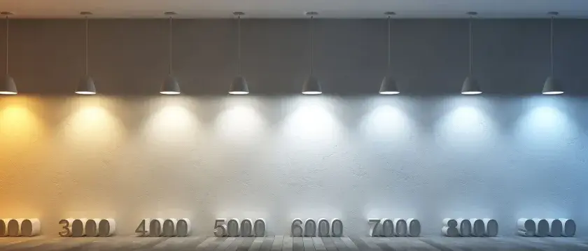 Éclairage LED montrant une gamme de température de couleur, du chaud (1000K) au froid (10000K), illuminant un mur texturé.