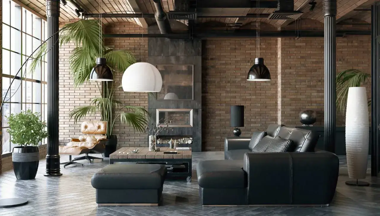 Salon avec une ambiance industrielle et naturelle : cuir noir, briques apparentes, plantes luxuriantes et mobilier design.